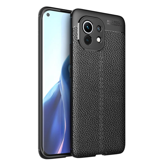 Black litchi-texture TPU shockproof phone case with raised camera cutouts.