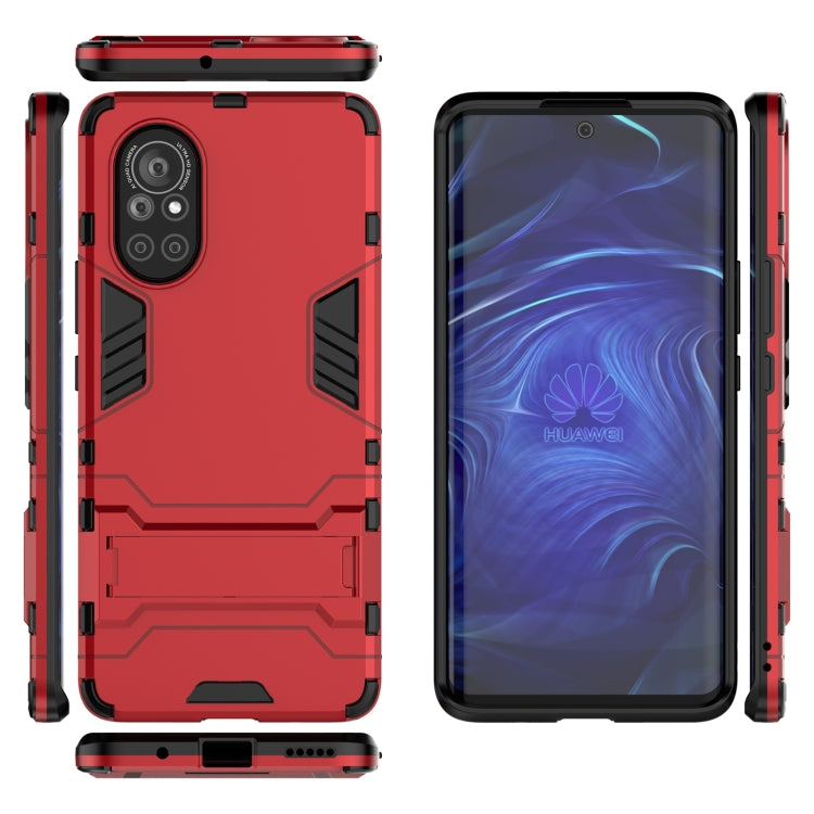 Red shockproof phone case with rugged armor panels, camera cutout, and front cover view