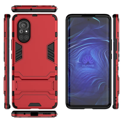 Red shockproof phone case with rugged armor panels, camera cutout, and front cover view