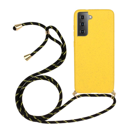 Yellow wheat-straw TPU phone case with black lanyard strap and gold-tone ends