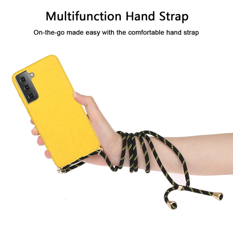 Yellow wheat-straw TPU phone case with braided hand strap and gold-tone clips