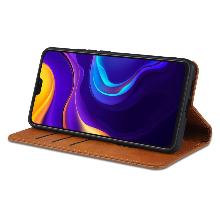 Tan magnetic flip leather phone case, standing support with phone screen visible