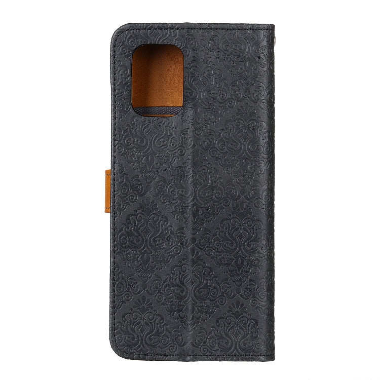 Black embossed floral PU leather flip phone wallet case with camera cutout and copper trim