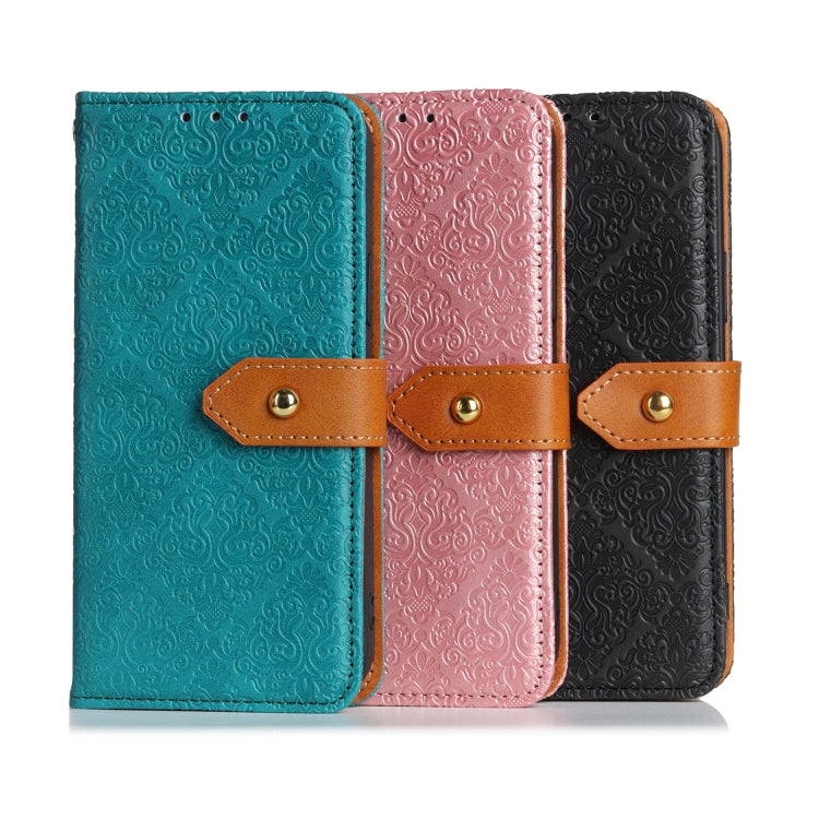 Embossed floral PU leather flip phone wallet cases in teal, pink, and black with copper clasps