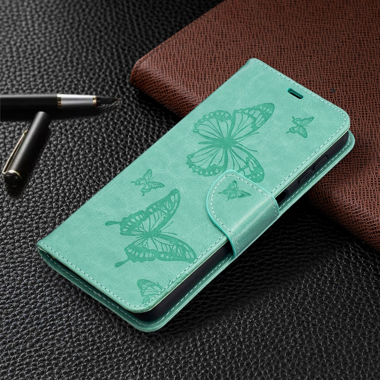 Green PU leather phone wallet case with embossed butterflies and front buckle strap