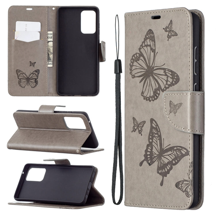 Embossed butterfly PU leather flip phone case in taupe gray with lanyard and card slot wallet.