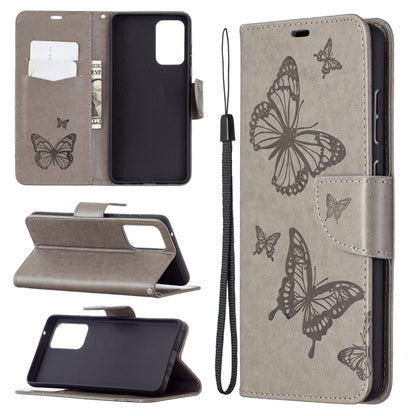 Embossed butterfly PU leather flip phone case in taupe gray with lanyard and card slot wallet.