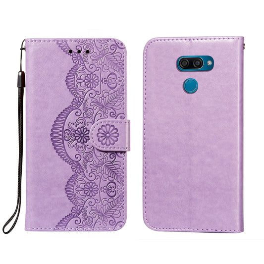 Purple leather phone wallet case with embossed floral vine pattern and magnetic flap.