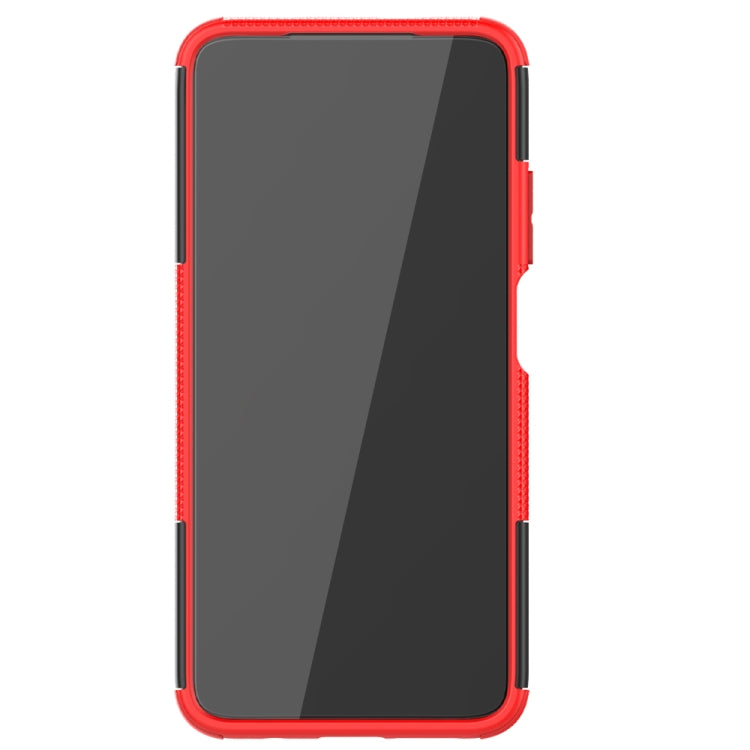 Red and black rugged phone case with tire-texture grip, slim front lip and side buttons