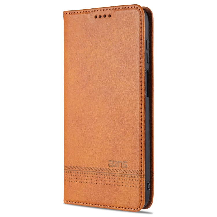 Light brown leather flip phone case with card slot section and magnetic closure.