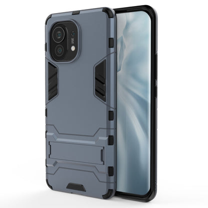 Navy blue rugged shockproof phone case with holder, dual-layer protection.