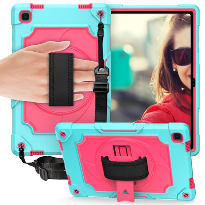 Turquoise and pink shockproof tablet case with black hand strap and kickstand