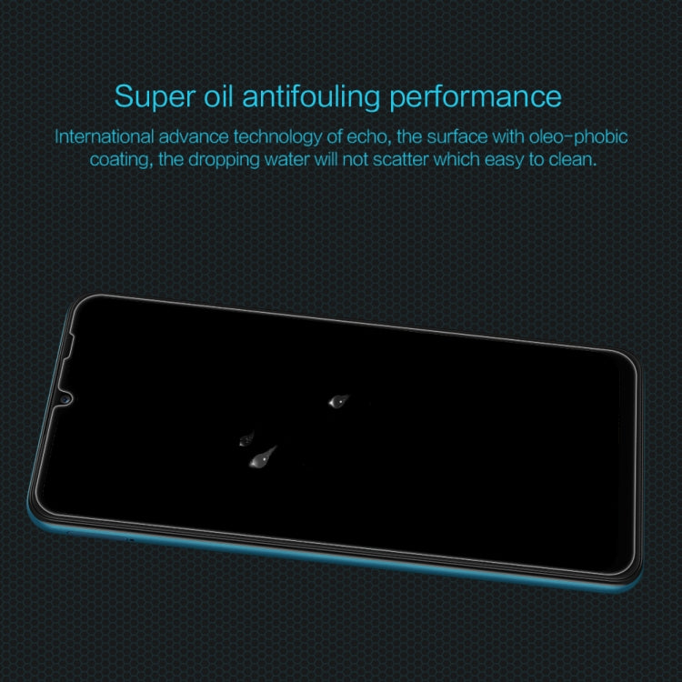 NILLKIN tempered glass screen protector film on smartphone with smooth black screen