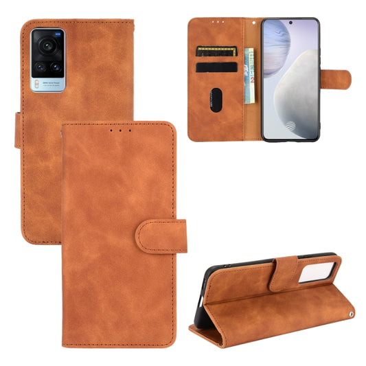 Brown PU leather flip phone wallet case with magnetic-style buckle, card slots, and stand