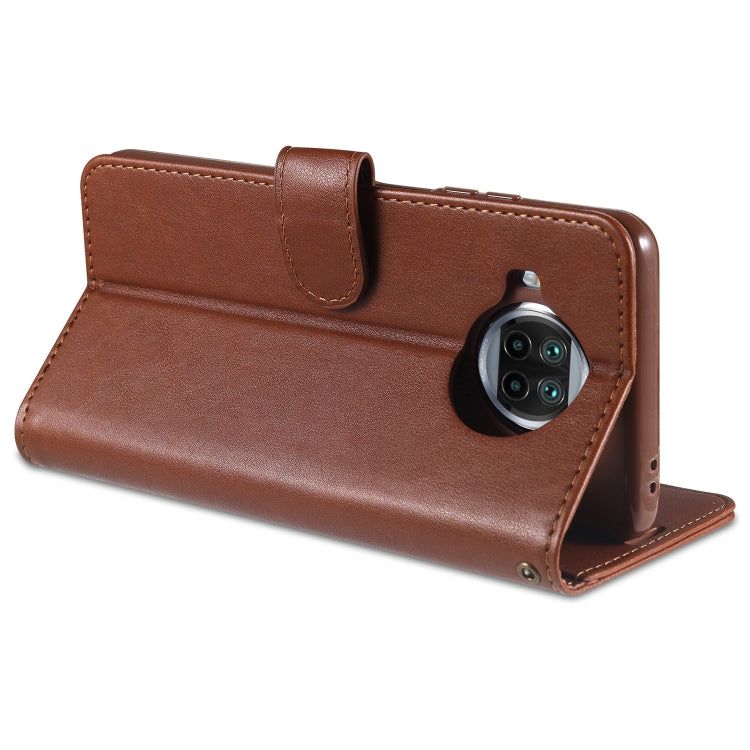 Brown flip wallet phone case with front card slots and camera cutout