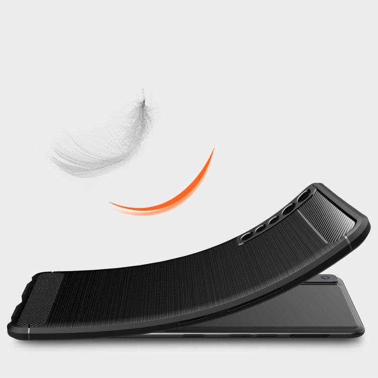 Black carbon fiber TPU case corner protection with textured grip surface