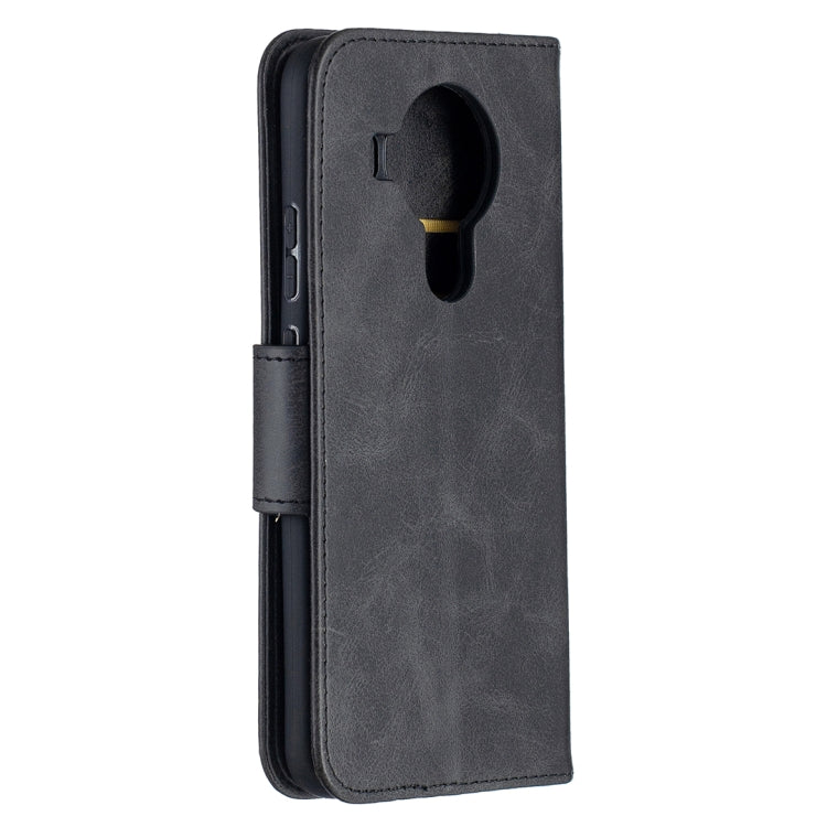 Black leather-style flip phone wallet case with cutout for camera and speaker