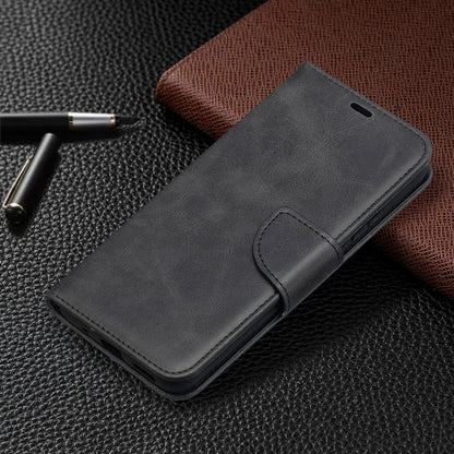 Black leather-style flip phone wallet case with smooth finish and front pocket
