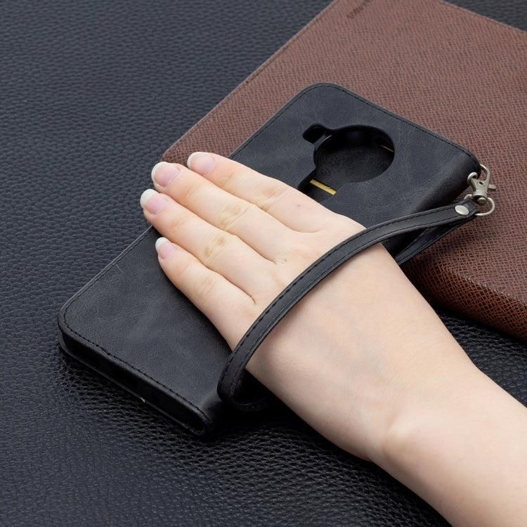 Black flip phone wallet case with front cutout and wrist strap