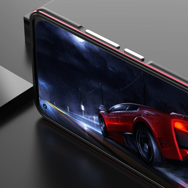 Protective phone case with metal frame and lens protector, side view in black with red trim