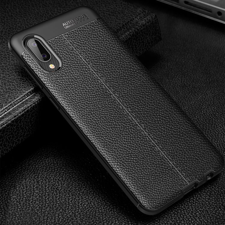 Black litchi-texture TPU phone case with camera cutout and protective edge