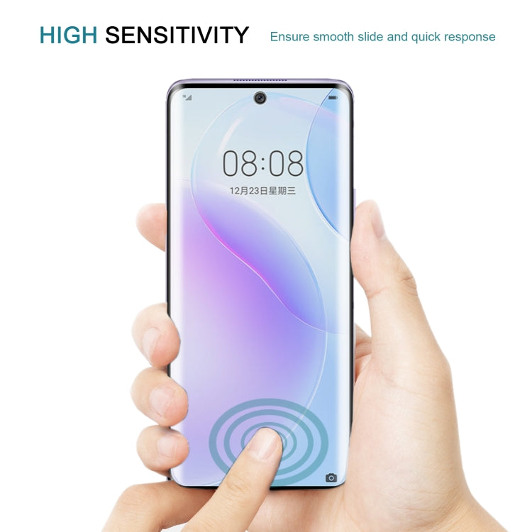 Tempered glass screen protector film on smartphone with fingerprint sensor cutout