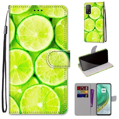 Phone wallet case with lanyard, flip cover, card slots; green lime slice pattern.