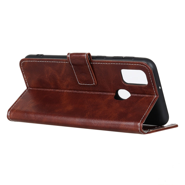 Brown leather flip phone case folded into a stand with cutouts for ports