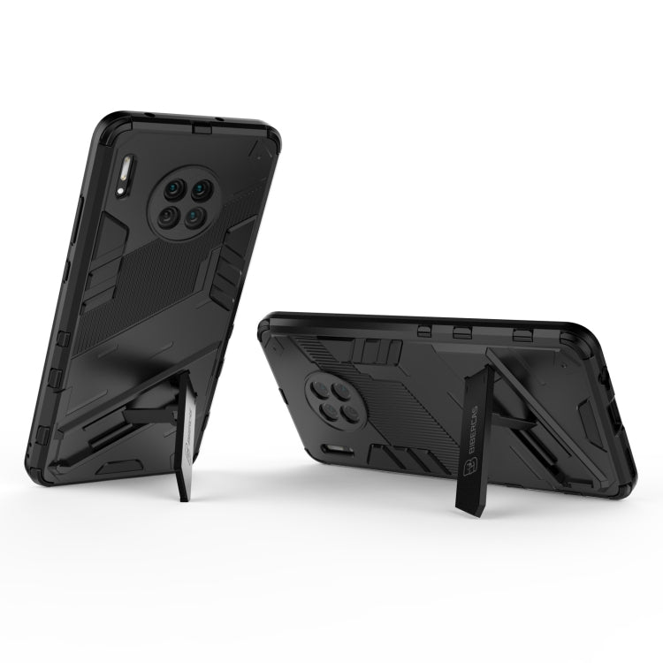 Black rugged phone case with kickstand design and port cutouts, shown back view