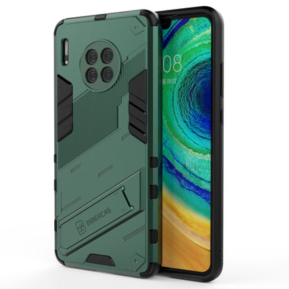 Rugged green phone case with textured armor, shockproof TPU, camera cutouts and grips