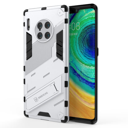 White and black shockproof phone case with rugged armor design and camera cutouts.