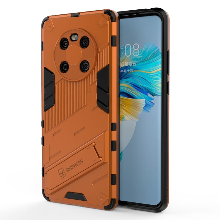Orange and black shockproof phone case with armor design, side grips, and camera cutouts.