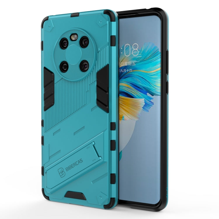 Turquoise rugged phone case with armor texture and black side grips, open to show front