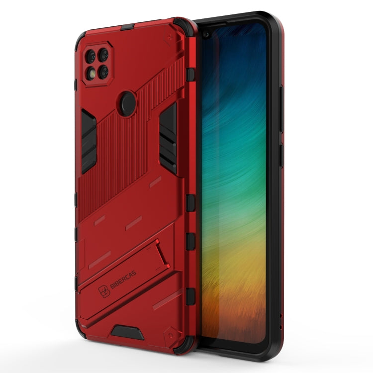 Red shockproof phone case with armored texture, camera cutout, and raised edges