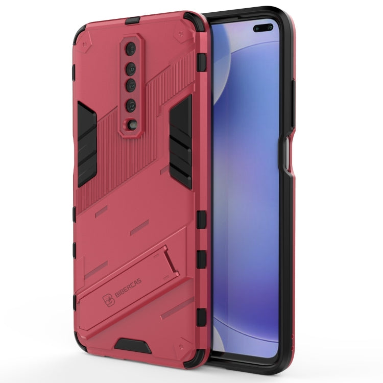 Rugged shockproof phone case with holder, red back with camera cutouts, front display visible.