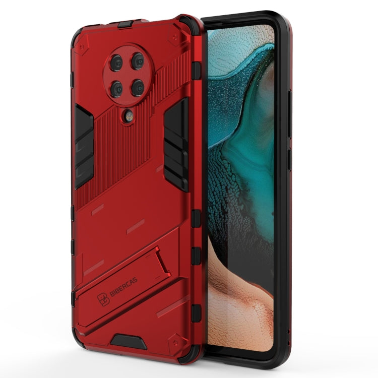 Red shockproof phone case with textured rails and protective bezel around display