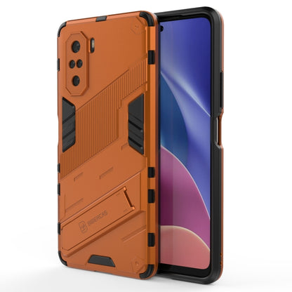 Orange rugged armor phone case with textured grip panels and raised screen edges
