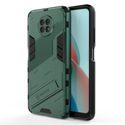 Green rugged phone case with raised camera lens area and secure edge protection
