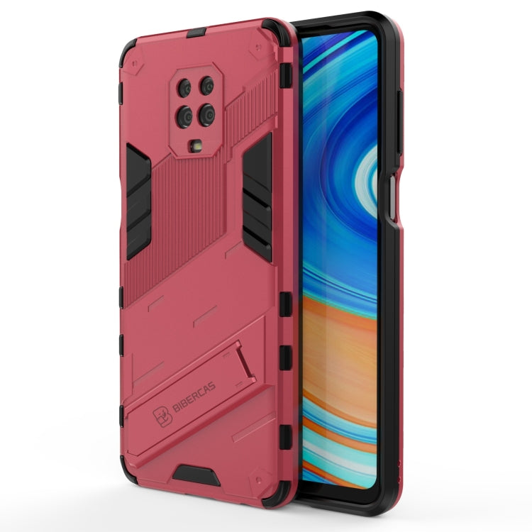 Rugged shockproof phone case with holder, red back with textured armor and black accents.