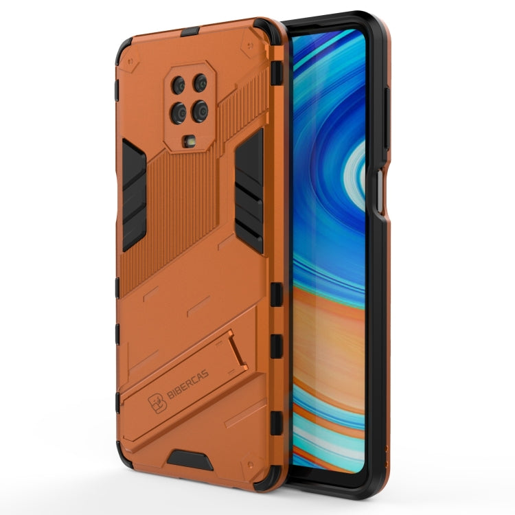 Orange rugged phone case with shockproof bumper and hidden holder, front view on phone