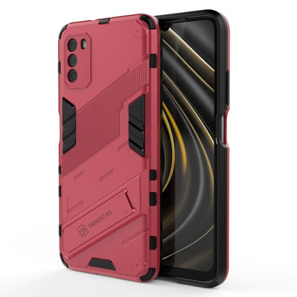 Rugged shockproof phone case with holder, red rugged back with black inserts, phone shown sideways.