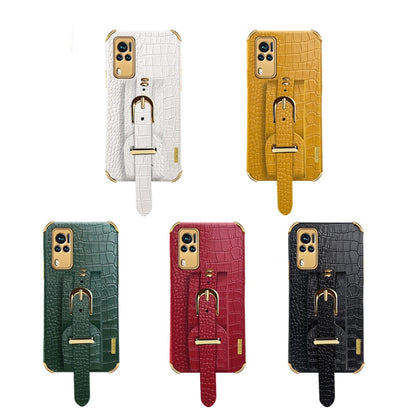 Crocodile-pattern TPU leather cases with wrist straps shown in multiple colors