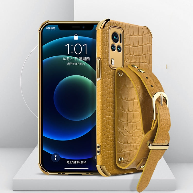 Yellow crocodile-pattern TPU leather case with wrist strap and gold buckle, phone shown