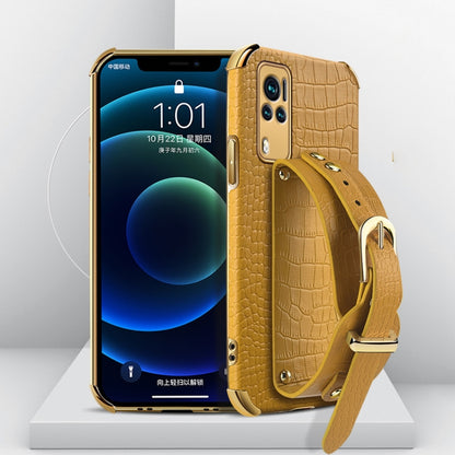 Yellow crocodile-pattern TPU leather case with wrist strap and gold buckle, phone shown