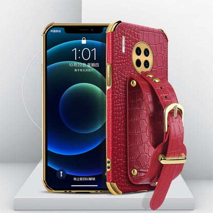 Red crocodile-pattern TPU phone case with wrist strap and gold ring clasp