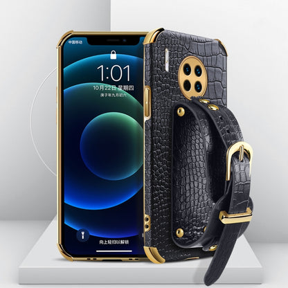 Black crocodile-pattern TPU phone case with wrist strap for Huawei, camera cutout and studs.