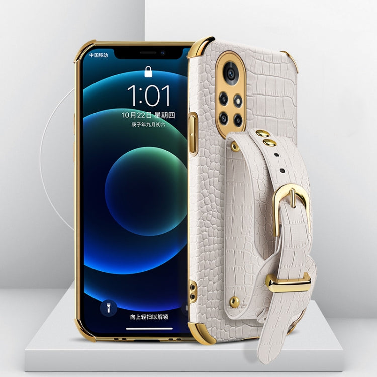 Electroplated TPU crocodile-pattern phone case with wrist strap, white (angled view)