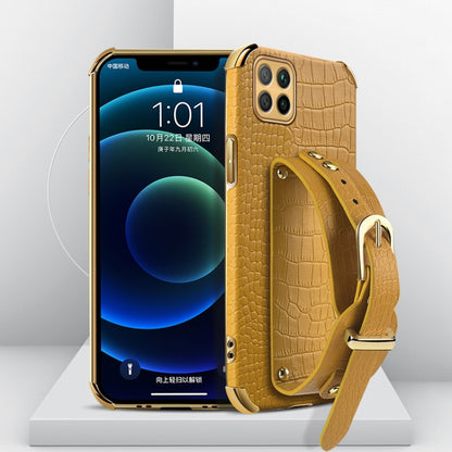 Electroplated TPU crocodile-pattern phone case with wrist strap, gold (front view)