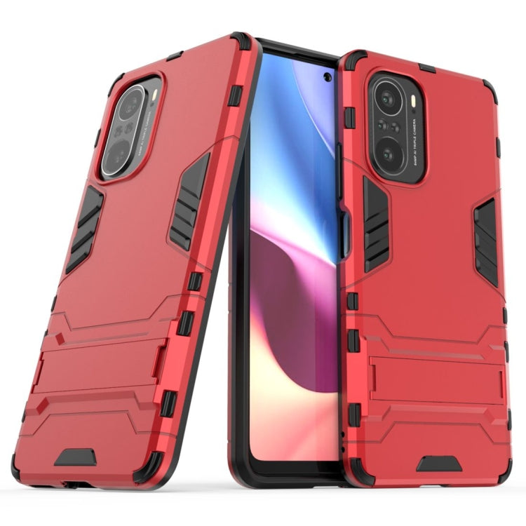 Shockproof red protective phone case with kickstand detail and camera openings