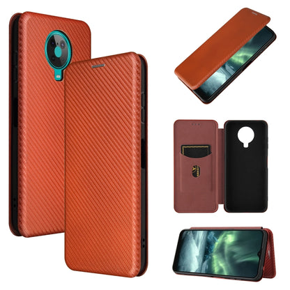 Magnetic flip phone case with card slot, carbon fiber texture, brown/orange
